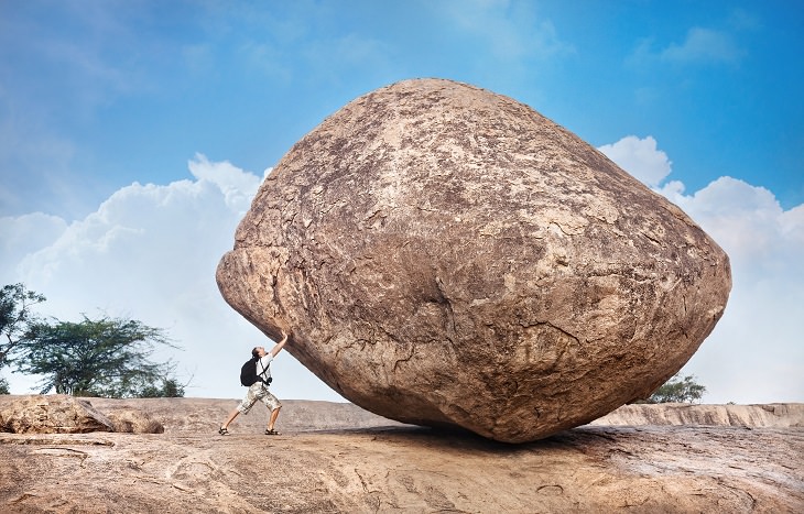 Person overcoming obstacles on a path